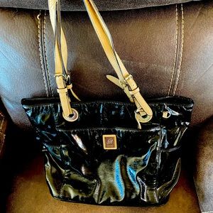 Rich black Paton leather purse is a show stopper